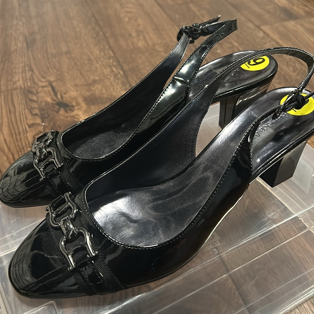 NEW PRICE!  NWOT
Trendy black patent slingbacks.